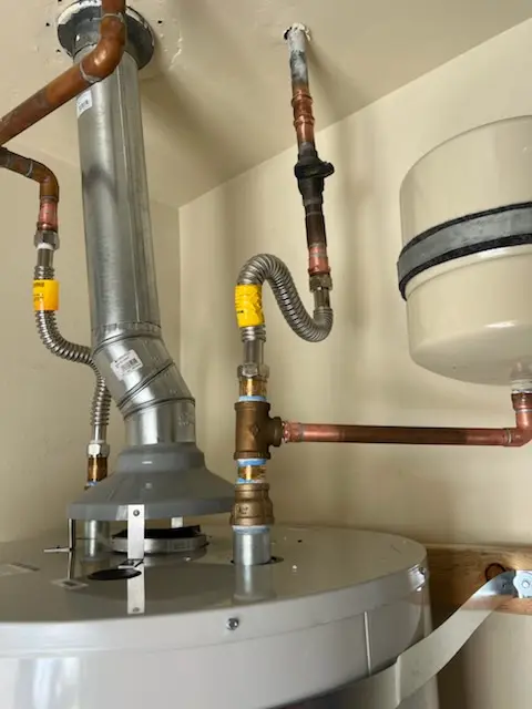 Water heater installation and plumbing repair in Hill